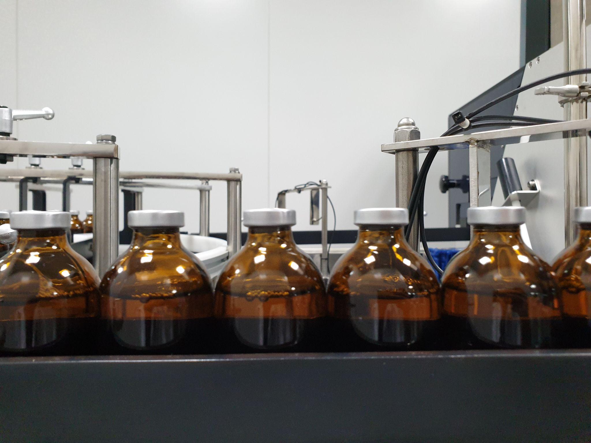 IMAGE PLACEHOLDER — GMP veterinary pharmaceutical quality control laboratory and sterile manufacturing environment
